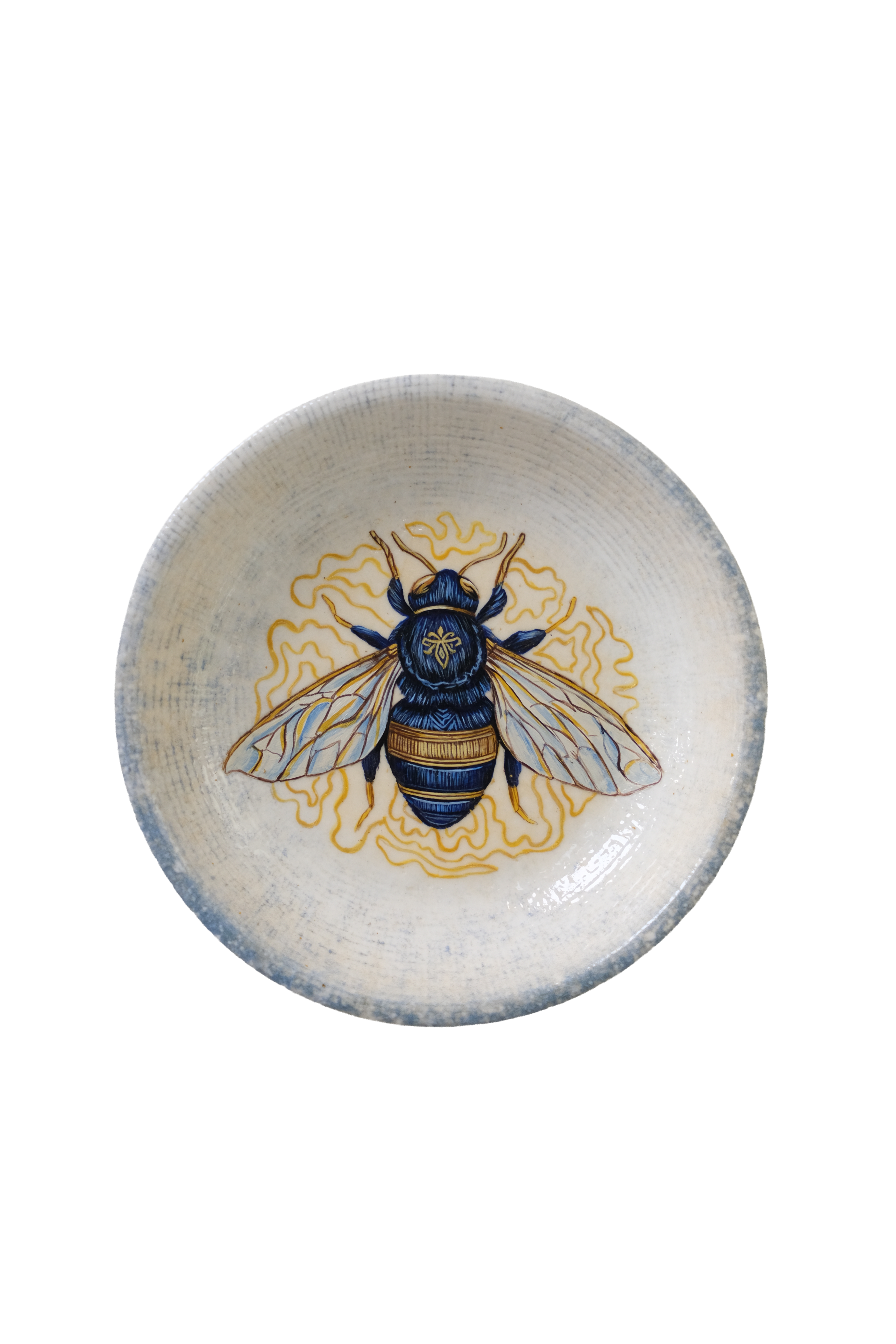 Decorative acrylic plate artwork featuring a detailed blue and gold bee surrounded by intricate golden ornamental linework.