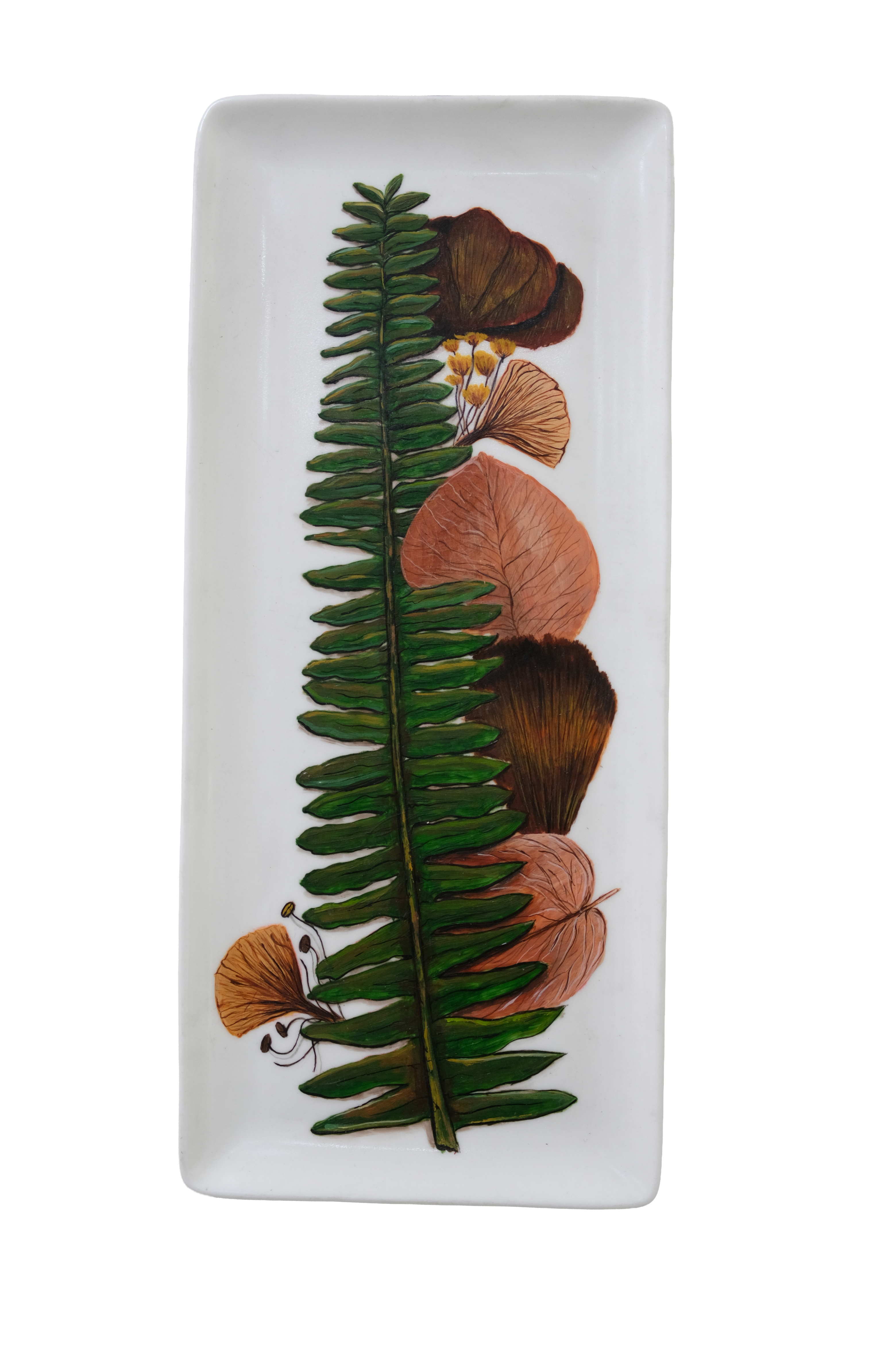 Decorative acrylic plate artwork featuring a detailed green fern surrounded by autumn leaves and botanical elements in earthy tones.